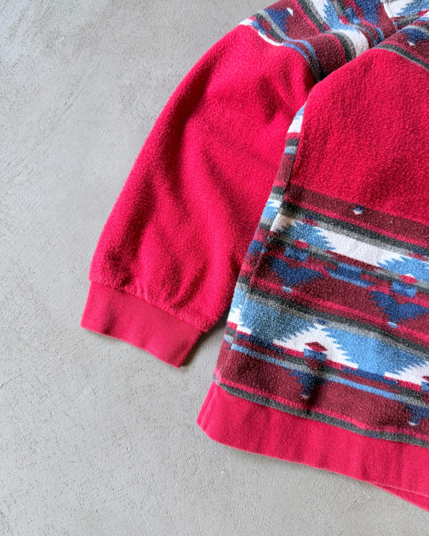 Années 90 - Sweat à capuche zippé 1/4 Aztec Rouge/Bleu - T.S
