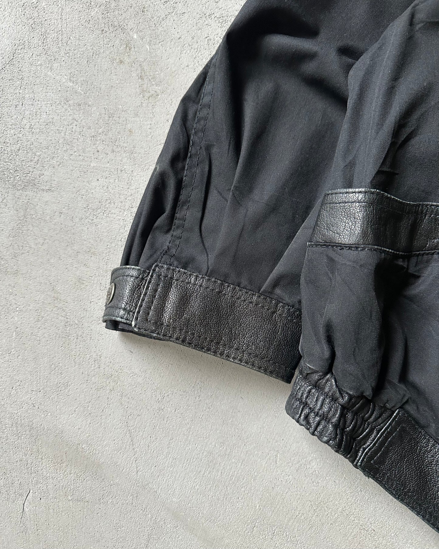 Années 1980 - Veste asymétrique noire McDouglas - L