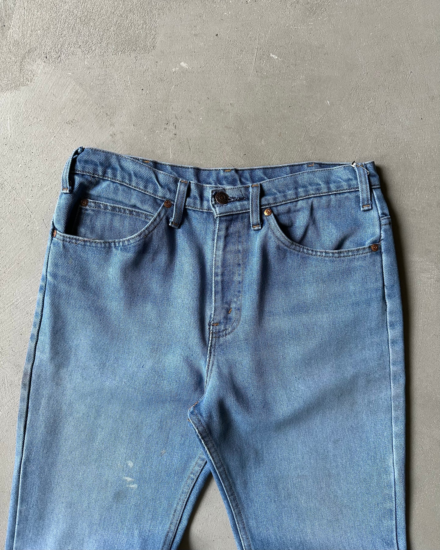 Années 80 - Jean bootcut uni délavé à poches plates - 32x30